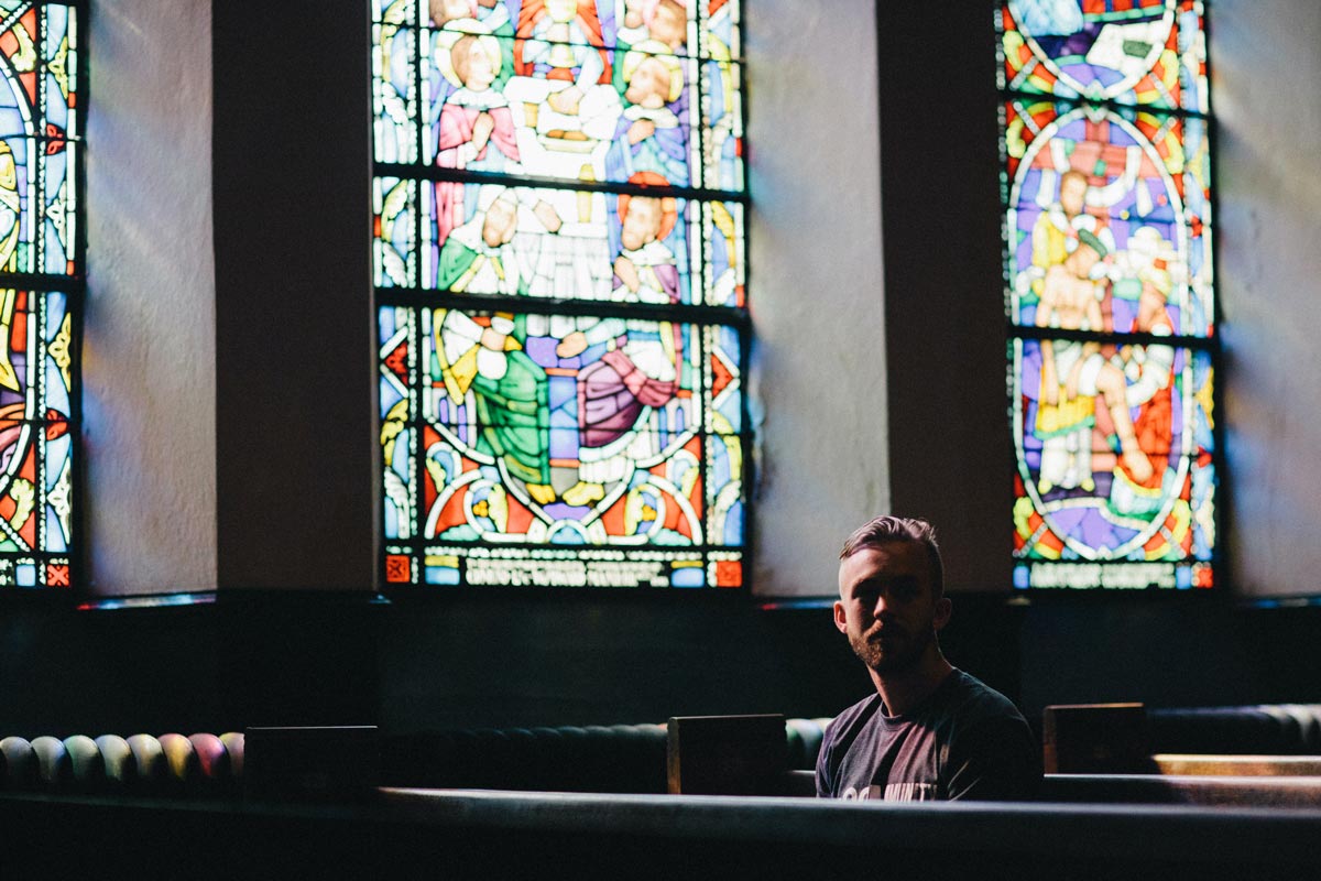 man alone in church